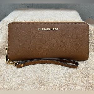 Michael Kors brown wallet wristlet in very good condition